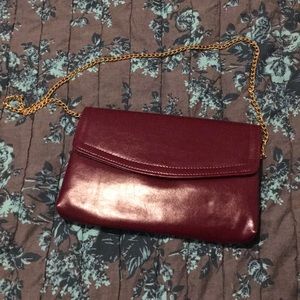 Vintage burgundy handbag with brass chain vegan